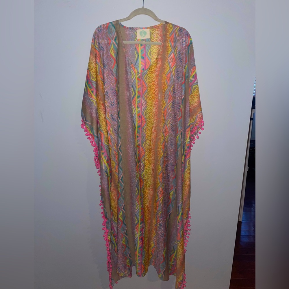 Gorgeous muumuu. Never worn.